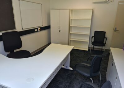 Rapidline wmcc cantilever visitor chair, Rapidspan desk with metal modesty panel, rapidline bookcase and stationery cupboard